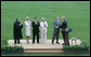 President George W. Bush congratulates former Idaho Gov. Dirk Kempthorne, as Kempthorne’s family and Supreme Court Justice Antonin Scalia, left, applaud following the swearing-in ceremony for Kempthorne as the new U.S. Secretary of Interior, Wednesday, June 7, 2006 on the South Lawn of the White House in Washington. White House photo by David Bohrer
