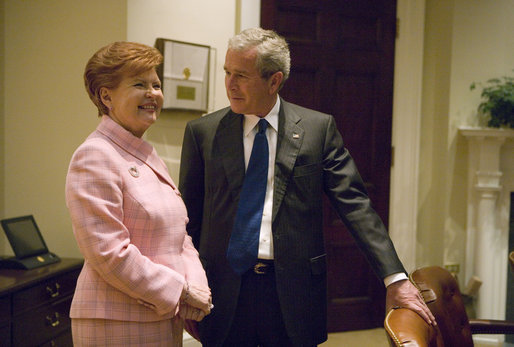 President George W. Bush talks with President Vaira Vike-Freiberga of Latvia in the Roosevelt Room Thursday, June 8, 2006. White House photo by Kimberlee Hewitt