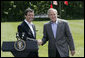 President George W. Bush and Prime Minister Anders Fogh Rasmussen of Denmark meet at Camp David Friday, June 9, 2006. White House photo by Eric Draper