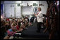 Mrs. Lynne Cheney takes questions from children of the officers and crew aboard the USS George Washington, Saturday, June 10, 2006, in Norfolk, Virginia during the ship's annual Family Day event. White House photo by David Bohrer