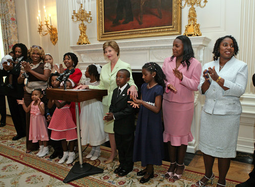 Mrs. Laura Bush speaks during a reception for the National Center for Missing and Exploited Children in the State Dining Room of the White House Monday, June 12, 2006. White House photo by Shealah Craighead