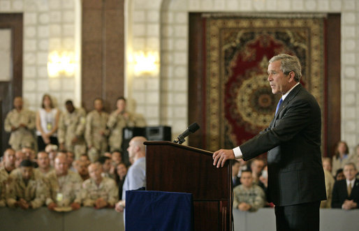 President George W. Bush speaks to U.S. troops and U.S. embassy personnel during an unannounced 5-hour trip to Baghdad, Iraq, Tuesday, June 13, 2006. "These are historic times," said the President. "The mission that you're accomplishing here in Iraq will go down in the history books as an incredibly important moment in the history of freedom and peace; an incredibly important moment of doing our duty to secure our homeland." White House photo by Eric Draper