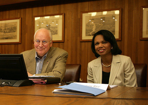Vice President Dick Cheney and Secretary of State Condoleezza Rice smile while participating in a video teleconference from Camp David, Md. with President Bush and Iraqi Prime Minister Nouri al-Maliki in Baghdad, Tuesday, June 13, 2006. White House photo by David Bohrer