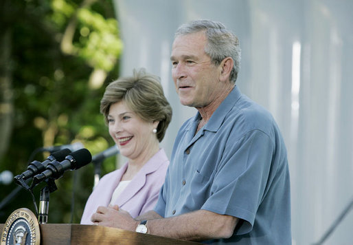 President George W. Bush and Laura Bush welcome guests to the annual Congressional Picnic on the South Lawn of the White House Wednesday evening, June 15, 2006, hosting members of Congress and their families to the "Rodeo" theme picnic. White House photo by Paul Morse