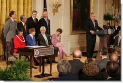 President George W. Bush addresses invited guests in the East Room of the White House prior to signing a proclamation to create the Northwestern Hawaiian Islands Marine National Monument, Wednesday, June 15, 2006.The proclamation will bring nearly 140,000 square miles of the Northwestern Hawaiian Island Coral Reef Ecosystem under the nation's highest form of marine environmental protection. Mrs. Laura Bush joined the President and distinguished guests on stage, seated from left to right, Hawaii Gov. Linda Lingle; marine biologist Sylvia Earle; and documentary filmmaker Jean-Michel Cousteau, Standing ,left to right, are U.S. Rep. Ed Case, D-Hawaii; U.S. Sen. Daniel Akaka, D-Hawaii; U.S. Commerce Secretary Carlos Gutierrez and U.S. Interior Secretary Dirk Kempthorne. White House photo by Shealah Craighead