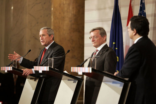 President George W. Bush delivers a statement during a press availability Wednesday, June 21, 2006, with Chancellor Wolfgang Schuessel of Austria, center, and European Union President Jose Manuel Barroso at the Hofburg Palace in Vienna during U.S.-EU Summit. Said the President, "We talked about democracy and new democracies, and I want to thank the European Union for its strong support of Afghanistan and Iraq." White House photo by Paul Morse