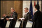 President George W. Bush delivers a statement during a press availability Wednesday, June 21, 2006, with Chancellor Wolfgang Schuessel of Austria, center, and European Union President Jose Manuel Barroso at the Hofburg Palace in Vienna during U.S.-EU Summit. Said the President, "We talked about democracy and new democracies, and I want to thank the European Union for its strong support of Afghanistan and Iraq." White House photo by Paul Morse