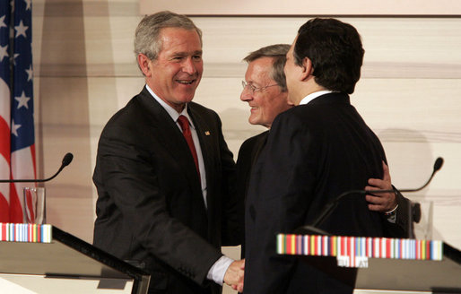 President George W. Bush shakes the hands of Chancellor Wolfgang Schuessel of Austria, center, and European Union President Jose Manuel Barroso following a press availability Wednesday, June 21, 2006, at the Hofburg Palace in Vienna. White House photo by Paul Morse
