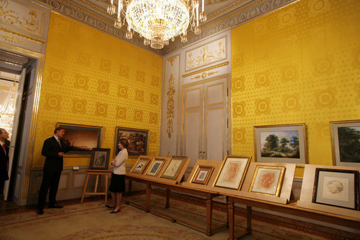 Mrs. Laura Bush is given a tour of one of the gallery rooms at the Albertina Museum in Vienna, Austria, Wednesday, June 21, 2006, by Dr. Klaus Schroeder, director of the museum. White House photo by Shealah Craighead