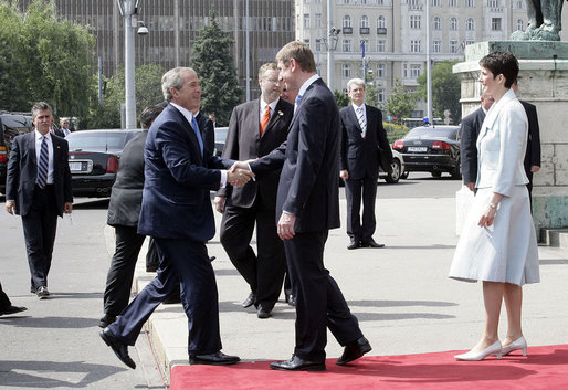 Prime Minister Ferenc Gyurcsany and his wife Dr. Klara Dobrev welcome President George W. Bush and Mrs. Laura Bush to the Hungarian Parliament building in Budapest, Hungary, Thursday, June 22, 2006. White House photo by Eric Draper