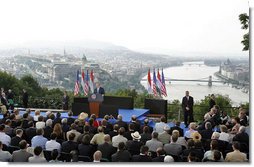 President George W. Bush speaks from Gellert Hill in Budapest, Hungary, Thursday, June 22, 2006. "From this spot you could see tens of thousands of students and workers and other Hungarians marching through the streets," said President Bush in his remarks about the 1956 Hungarian uprising. "They called for an end to dictatorship, to censorship, and to the secret police. They called for free elections, a free press, and the release of political prisoners. These Hungarian patriots tore down the statue of Josef Stalin, and defied an empire to proclaim their liberty." White House photo by Paul Morse