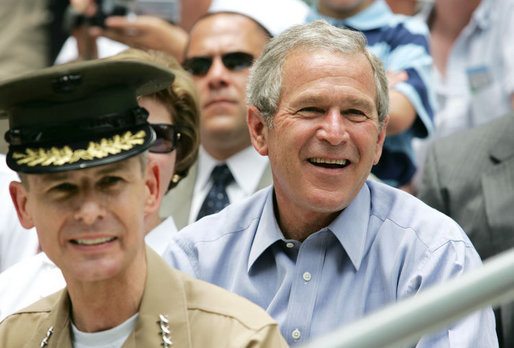President George W. Bush is joined by General Peter Pace, chairman of the Joint Chiefs of Staff and Tee Ball Commissioner for the opening Tee Ball game of the 2006 season on the South Lawn of the White House, Friday, June 23, 2006, between the McGuire AFB Little League Yankees and the Dolcom Little League Indians of the Naval Submarine Base from Groton, Ct. White House photo by Shealah Craighead