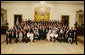 President George W. Bush meets with the 2006 Presidential Scholars in the East Room Monday, June 26, 2006. Established in 1964, the program recognizes up to 141 distinguished graduating high school seniors. White House photo by Paul Morse