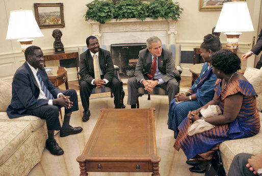 President George W. Bush meets with the National Endowment for Democracy award recipients in the Oval Office Tuesday, June 27, 2006. From left, they are Alfred Taban of Sudan, Dr. Reginald Matchaba-Hove of Zimbabwe, Immaculee Birhaheka of the Democratic Republic of the Congo and Zainab Hawa Bangura of Sierra Leone. White House photo by Kimberlee Hewitt