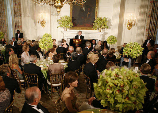 President George W. Bush addresses his welcoming remarks to invited guests Thursday evening, June 29, 2006, during an official dinner in the State Dining Room at the White House in honor of Japanese Prime Minister Junichiro Koizumi’s visit to the United States. White House photo by Paul Morse