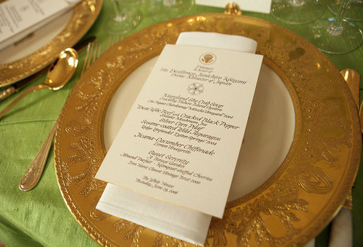 A place setting of the Clinton State Service is on display during the preview of the table setting for the official dinner honoring His Excellency Junichiro Koizumi, Prime Minister of Japan, in the State Dining Room Thursday, June 29, 2006. The tables are draped with jasmine green silk tablecloths. The floral centerpieces are comprised of pave spheres of green cymbidium orchids. White House photo by Shealah Craighead