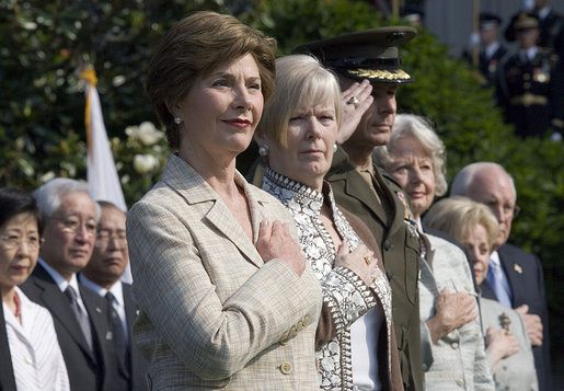 Mrs. Laura Bush stands with Lynne Pace and her husband, Chairman of the Joint Chiefs of Staff General Peter Pace, during the official arrival ceremony for Prime Minister Junichiro Koizumi of Japan on the South Lawn Thursday, June 29, 2006. White House photo by Eric Draper