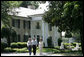 President George W. Bush, Laura Bush and Japanese Prime Minister Junichiro Koizumi, wearing a pair of Elvis-style sunglasses, tour the grounds of Graceland, the home of Elvis Presley, Friday, June 30, 2006, in Memphis. White House photo by Shealah Craighead