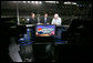 Vice President Dick Cheney talks with Chris Myers, left, and Jeff Hammond, center, of Fox Sports Network, Saturday, July 1, 2006, during a live TV interview held during the 2006 Pepsi 400 NASCAR race at Daytona International Speedway in Daytona, Fla. White House photo by David Bohrer