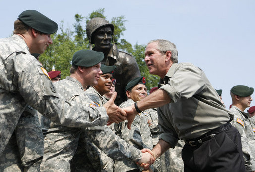 President George W. Bush meets U.S. Airborne and Special Forces troops following his remarks Tuesday, July 4, 2006, during an Independence Day celebration at Fort Bragg in North Carolina. President Bush thanked the troops and their families for their service to the nation. White House photo by Paul Morse