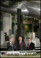 President George W. Bush is joined by Chicago Mayor Richard M. Daley, right, and Kurt Haunfelner, vice president of exhibits, left, as he is given a tour through the Museum of Science and Industry in Chicago, Friday, July 7, 2006, following his news conference at the museum. White House photo by Eric Draper