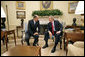 President George W. Bush meets with Prime Minister Janez Jansa of Slovenia in the Oval Office Monday, July 10, 2006. "I really appreciate the fact that you have made the courageous decision to help two young democracies, Afghanistan and Iraq, succeed. Your contributions in Afghanistan and Iraq will make a difference in achieving peace. And so thank you for that very much," said the President in his remarks to the press." White House photo by Eric Draper