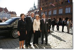 President George W. Bush and Laura Bush participate in an arrival ceremony with German Chancellor Angela Merkel and her husband Joachim Sauer in Stralsund, Germany, Thursday, July 13, 2006. White House photo by Paul Morse