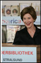 Mrs. Laura Bush speaks to school children during a visit Thursday, July 13, 2006, to the Stralsund Children’s Library in Stralsund, Germany, where Mrs. Bush participated in the ribbon cutting to open the exhibit America@yourlibrary. The America@yourlibrary is a new initiative to develop existing and new partnerships between German public libraries and the U.S. Embassy and Consulate Resource Centers. White House photo by Shealah Craighead