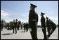 President George W. Bush and Laura Bush follow a Russian honor guard to place a wreath at the Monument to the Heroic Defenders of Leningrad, Friday, July 14, 2006, in St. Petersburg, Russia. White House photo by Eric Draper