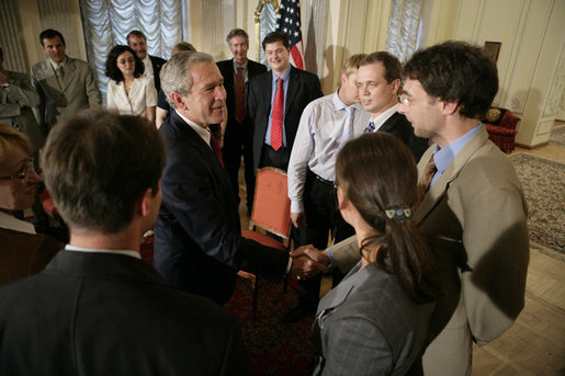 President George W. Bush meets participants at the roundtable discussion with Civil Society at the Consul General’s residence, Friday, July 14, 2006 in St. Petersburg, Russia. White House photo by Eric Draper