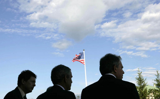 President George W. Bush, center, meets with Prime Minister Tony Blair of the United Kingdom on Konstantinovsky Palace Complex during the G8 Summit in Strelna, Russia, Sunday, July 16, 2006. White House photo by Eric Draper