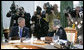 President George W. Bush talks with Japanese Prime Minister Junichiro Koizumi during a working session at the G8 Summit in Strelna, Russia, Sunday, July 16, 2006. White House photo by Eric Draper