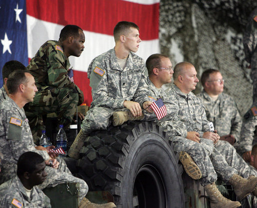 Soldiers from the Iowa Air and Army National Guard listen as Vice President Dick Cheney delivers remarks, Monday, July 17, 2006, at Camp Dodge in Johnston, Iowa. Camp Dodge, home of the National Maintenance Training Center, trains all of the Army, Army National Guard and Army Reserve maintenance companies in the United States. White House photo by David Bohrer