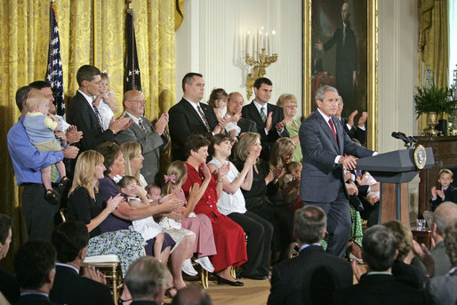 President George W. Bush delivers remarks about stem cell research policy legislation in the East Room Wednesday, July 19, 2006. "Each of these children was adopted while still an embryo, and has been blessed with the chance to grow up in a loving family," said the President of children sharing the stage with him. "These boys and girls are not spare parts. They remind us of what is lost when embryos are destroyed in the name of research." White House photo by Kimberlee Hewitt