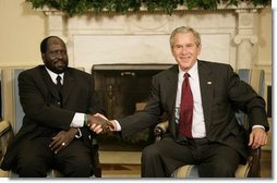 President George W. Bush welcomes Salva Kiir, the First Vice President of the Government of National Unity of Sudan and the President of Southern Sudan, during a meeting in the Oval Office Thursday, July 20, 2006.  White House photo by Eric Draper