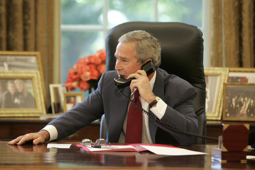 President George W. Bush offers his congratulations to Tour de France winner Floyd Landis during a phone call from the Oval Office, Sunday, July 23, 2006. White House photo by Kimberlee Hewitt