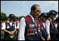 Members of the Korean War Veterans Association bow their heads during the invocation at the 2006 Korean War Veterans Armistice Day Ceremony, Thursday, July 27, 2006, at the Korean War Memorial in Washington, D.C. White House photo by David Bohrer