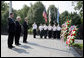 Vice President Dick Cheney stands with Secretary of the Interior Dirk Kempthorne, right, and South Korean Ambassador to the U.S. Tae Sik Lee, left, during a moment of silence after placing a wreath at the Korean War Memorial in Washington, D.C. to commemorate Korean War Veterans Armistice Day, Thursday, July 27, 2006. Today marks the 53rd anniversary of the end of the Korean War. White House photo by David Bohrer