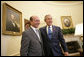 President George W. Bush welcomes Romanian President Traian Basescu to the Oval Office at the White House Thursday, July 27, 2006 in Washington, D.C. White House photo by Eric Draper
