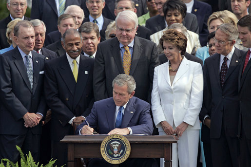 President George W. Bush signs H.R. 9, the Fannie Lou Hamer, Rosa Parks, and Coretta Scott King Voting Rights Act Reauthorization and Amendments Act of 2006, on the South Lawn Thursday, July 27, 2006. White House photo by Paul Morse