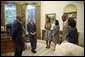 President George W. Bush meets with the Big Brother and Big Sister of the Year in the Oval Office Friday, July 28, 2006. From left, they are: Big Brother of the Year Sylvester Fulton of Memphis, Tenn.; LaMecca Butler, Betsy's little sister; Big Sister of the Year Betsy Gorman-Bernardi of Albany, N.Y.; Jeremy Moore, Sylvester's little brother; and President and CEO Judy Vredenburgh of BBBS of America. White House photo by Paul Morse