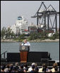 President George W. Bush addresses an audience on America's economy at the U.S. Coast Guard Integrated Support Command at the Port of Miami Monday, July 31, 2006. "It's an honor to be here at the largest container port in Florida and one of the most important ports in our nation," said President Bush. "From these docks, ships loaded with cargo deliver products all around the world carrying that label "Made in the USA."' White House photo by Kimberlee Hewitt