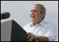 President George W. Bush discusses America's economy at the U.S. Coast Guard Integrated Support Command at the Port of Miami Monday, July 31, 2006. "It's an honor to be here at the largest container port in Florida and one of the most important ports in our nation," said President Bush. White House photo by Kimberlee Hewitt