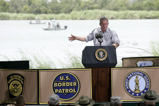 President George W. Bush delivers his remarks on immigration reform from a stage along the Rio Grande River on the U.S.-Mexico border Thursday, Aug. 3, 2006, at the Anzalduas County Park and Dam in Mission, Texas. White House photo by Eric Draper