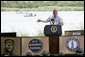 President George W. Bush delivers his remarks on immigration reform from a stage along the Rio Grande River on the U.S.-Mexico border Thursday, Aug. 3, 2006, at the Anzalduas County Park and Dam in Mission, Texas. White House photo by Eric Draper