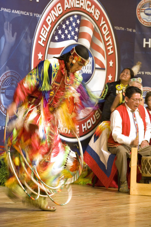 A member of The Seven Falls Indian Dancers performs during the second regional Helping America's Youth Conference on Friday, August 4, 2006, in Denver, Colorado. The dancers are from the Pawnee, Flandreau Santee-Sioux Crow Creek Sioux, and Cheyenne River Sioux tribes. The troupe has been dancing throughout Colorado for over 25 years. White House photo by Shealah Craighead