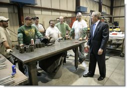 President George W. Bush praised small businesses in America as being vital to the economic growth of the country Thursday, Aug. 10, 2006, during his tour and visit with employees at Fox Valley Metal-Tech in Green Bay, Wis. White House photo by Eric Draper