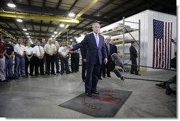 President George W. Bush praised small businesses in America as being vital to the economic growth of the country Thursday, Aug. 10, 2006, during his tour and visit with employees at Fox Valley Metal-Tech in Green Bay, Wis.  White House photo by Eric Draper