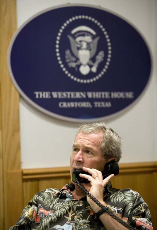President George W. Bush speaks with the Prime Minister of Lebanon during a phone call at the Bush Ranch in Crawford, Texas, Saturday, Aug. 12, 2006. White House photo by Eric Draper