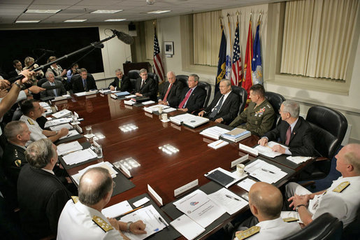 President George W. Bush talks with the press during a meeting with Vice President Dick Cheney, Defense Secretary Donald Rumsfeld and the Defense Policy and Programs Team at the Pentagon Monday, Aug. 14, 2006. White House photo by Eric Draper